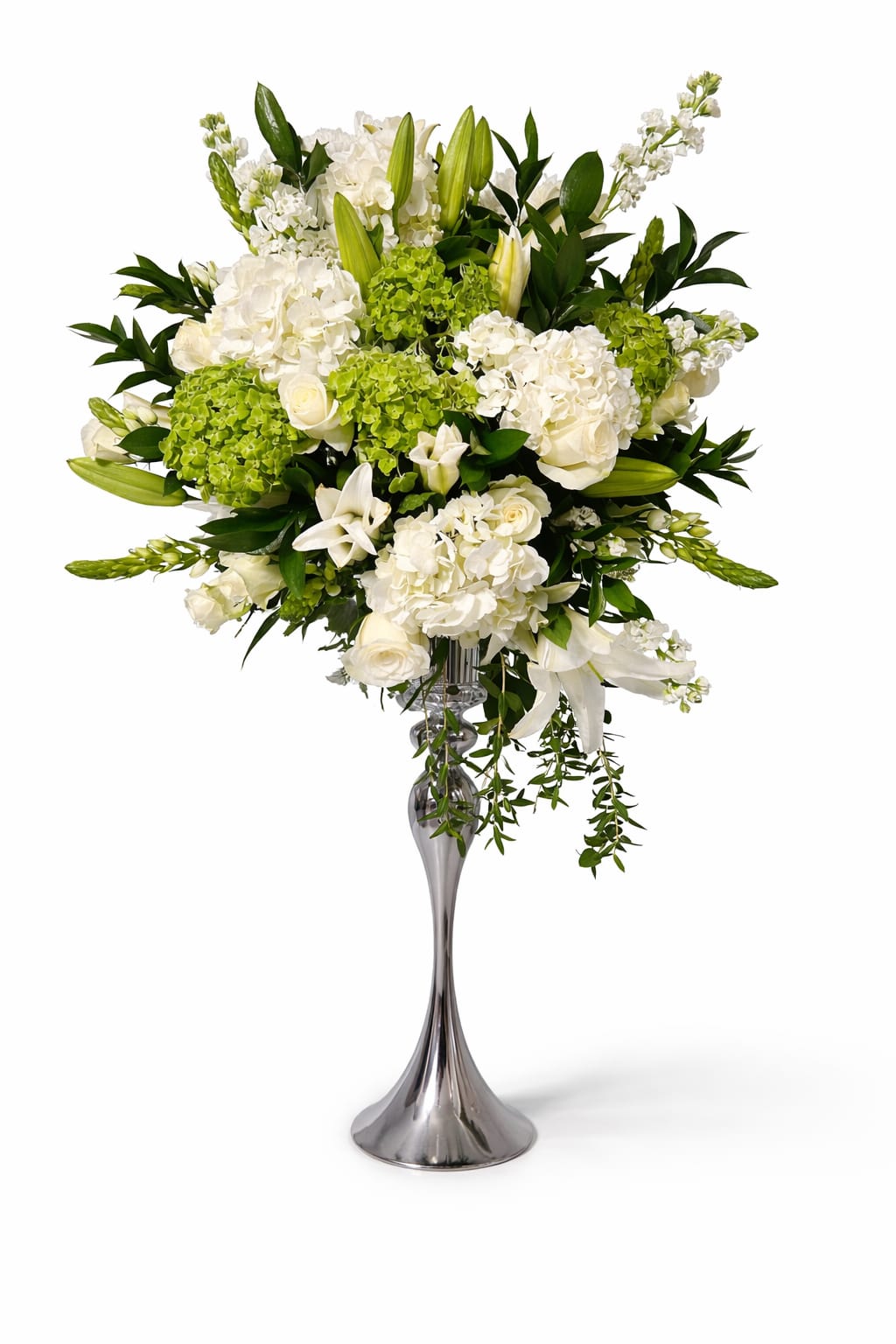 White floral arrangement in a tall silver vase