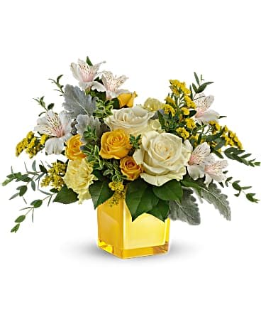Sweet Sunlight Bouquet - Bring sunshine to any occasion with this radiant bouquet of classic white roses and cheery yellow blooms! Arranged in a sunny keepsake cube, it's a gift that keeps on giving. This sunny gift includes white roses, yellow spray roses, light pink alstroemeria, yellow carnations, solidago, dusty miller, oregonia, parvifolia eucalyptus, and lemon leaf. Delivered in a Sunshine Color Splash Cube. 