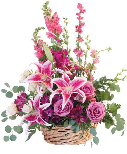 PINK FLORAL FANTASY BASKET ARRANGEMENT  - A fanciful basket full of lush blooms, Pink Floral Fantasy is a treat for the special people in your life! Stunning Stargazer lilies, lavender roses, white spray roses, and pink snapdragons spring forth in a design that's fit for royalty. Liven up their home with these gorgeous flowers today! 