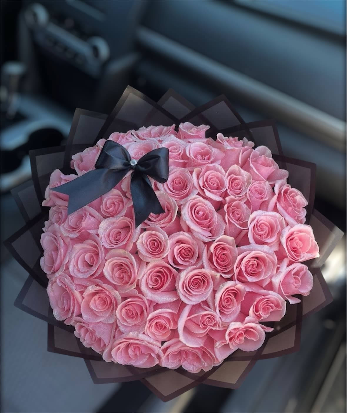 50 Light Pink Roses - Treat yourself (or someone special) to a bouquet of 50 pink roses! Each long stem has been carefully selected for its beauty and vibrancy, creating a stunning visual display. Perfect for sharing love and joy (or just adding a pop of pink) to any room.  