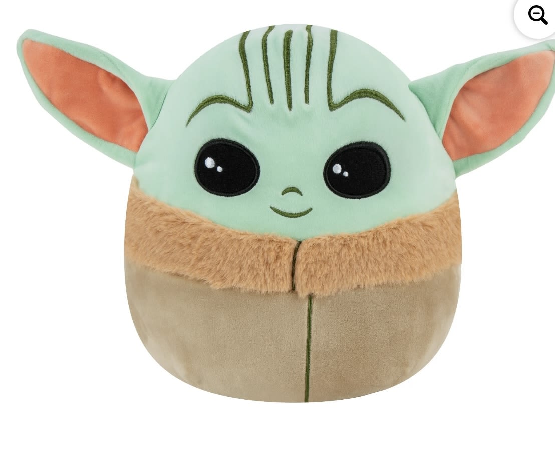 Plush Baby Yoda character with large ears and black eyes
