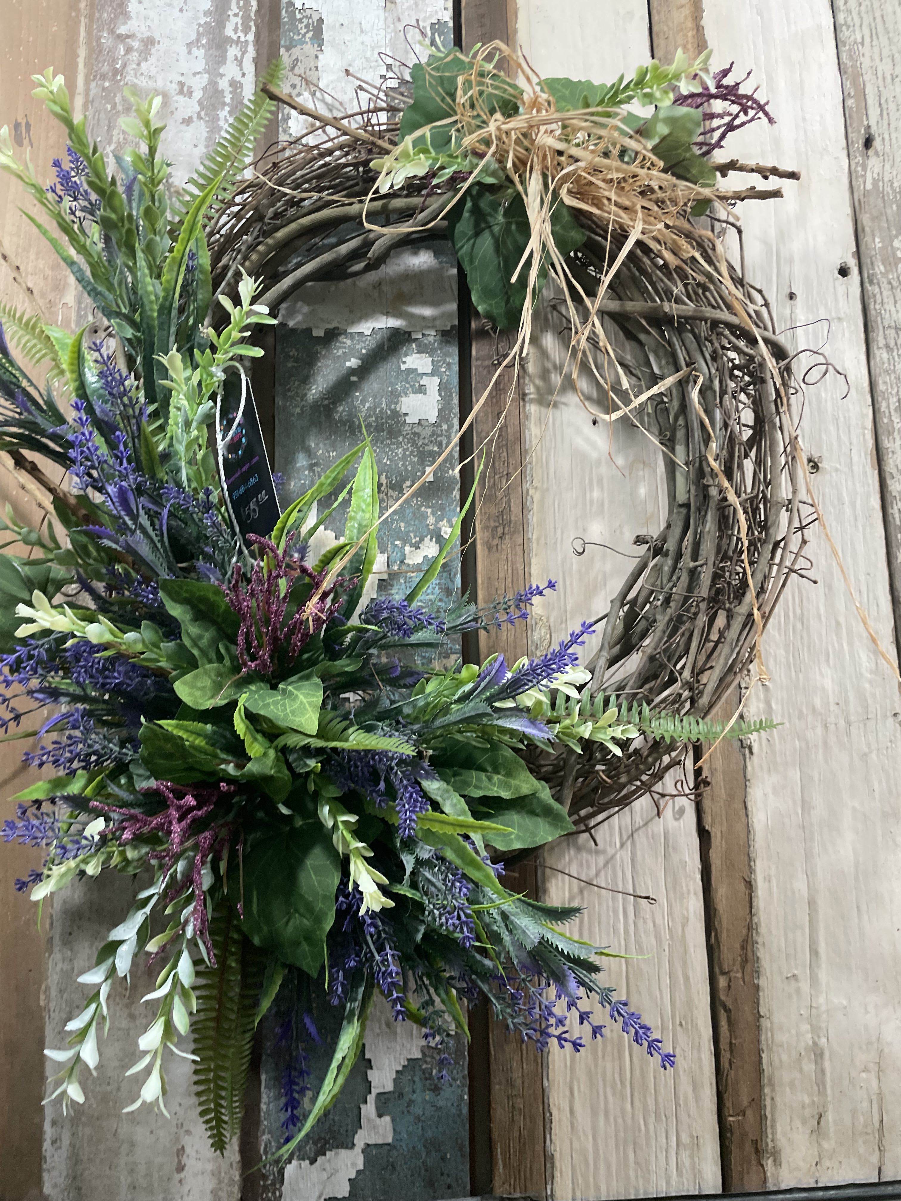 Springy Vines Wreath - A grapevine Wreath covered in the beautiful greens and mixed flowers such a trendy look to go with any decor.
