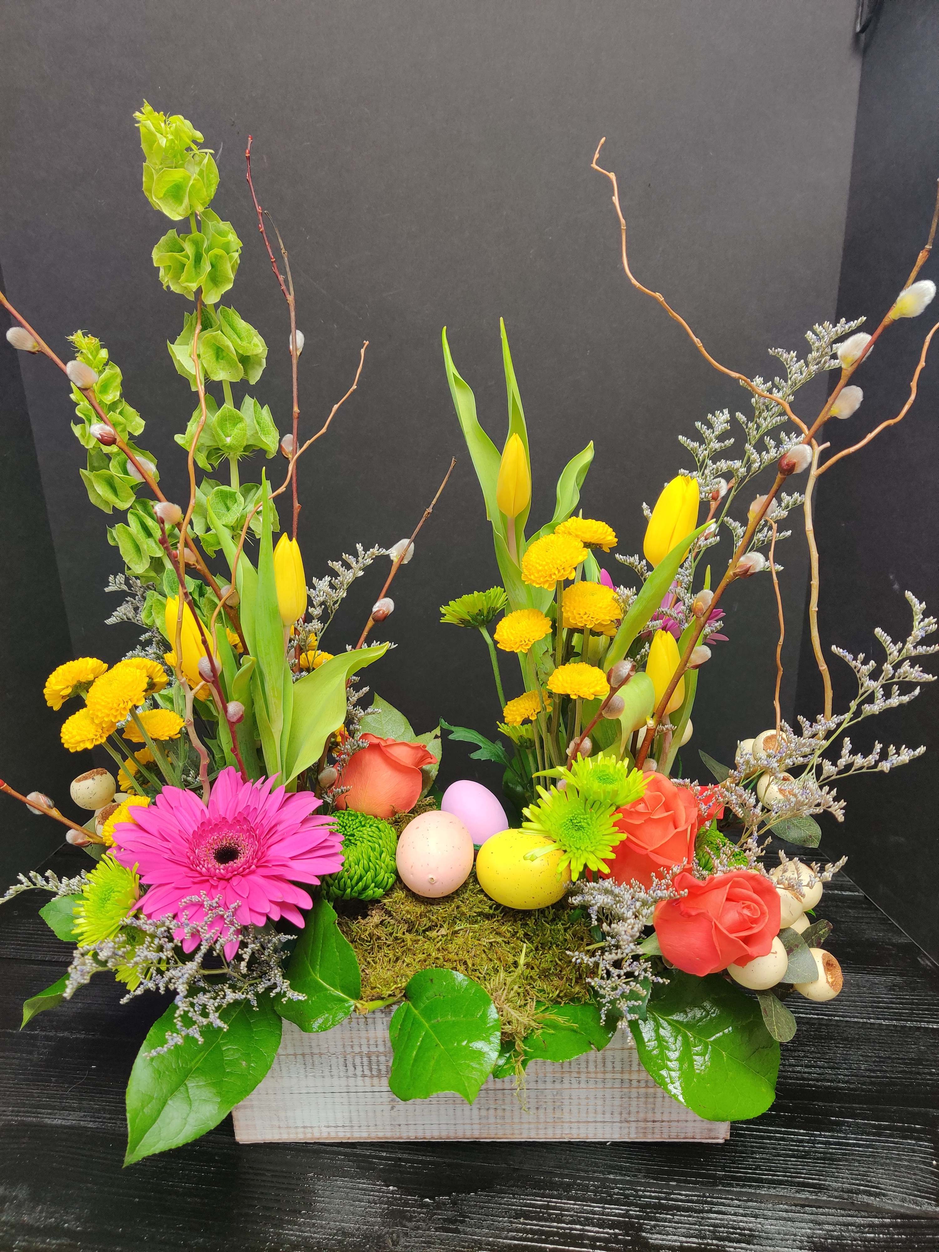 Breath of Spring  - A great centerpiece to bring spring to your table .