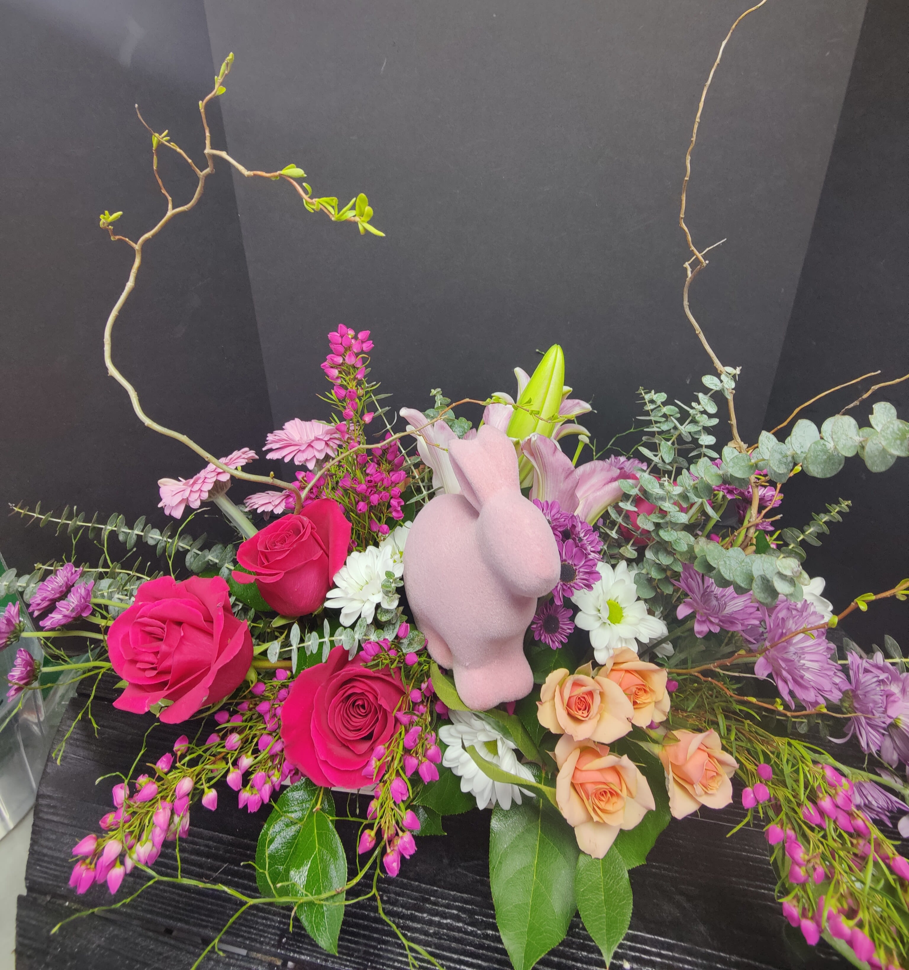 Easter parade centerpiece  - A box filled of your favorite Easter blooms complete with the Easter Bunny 