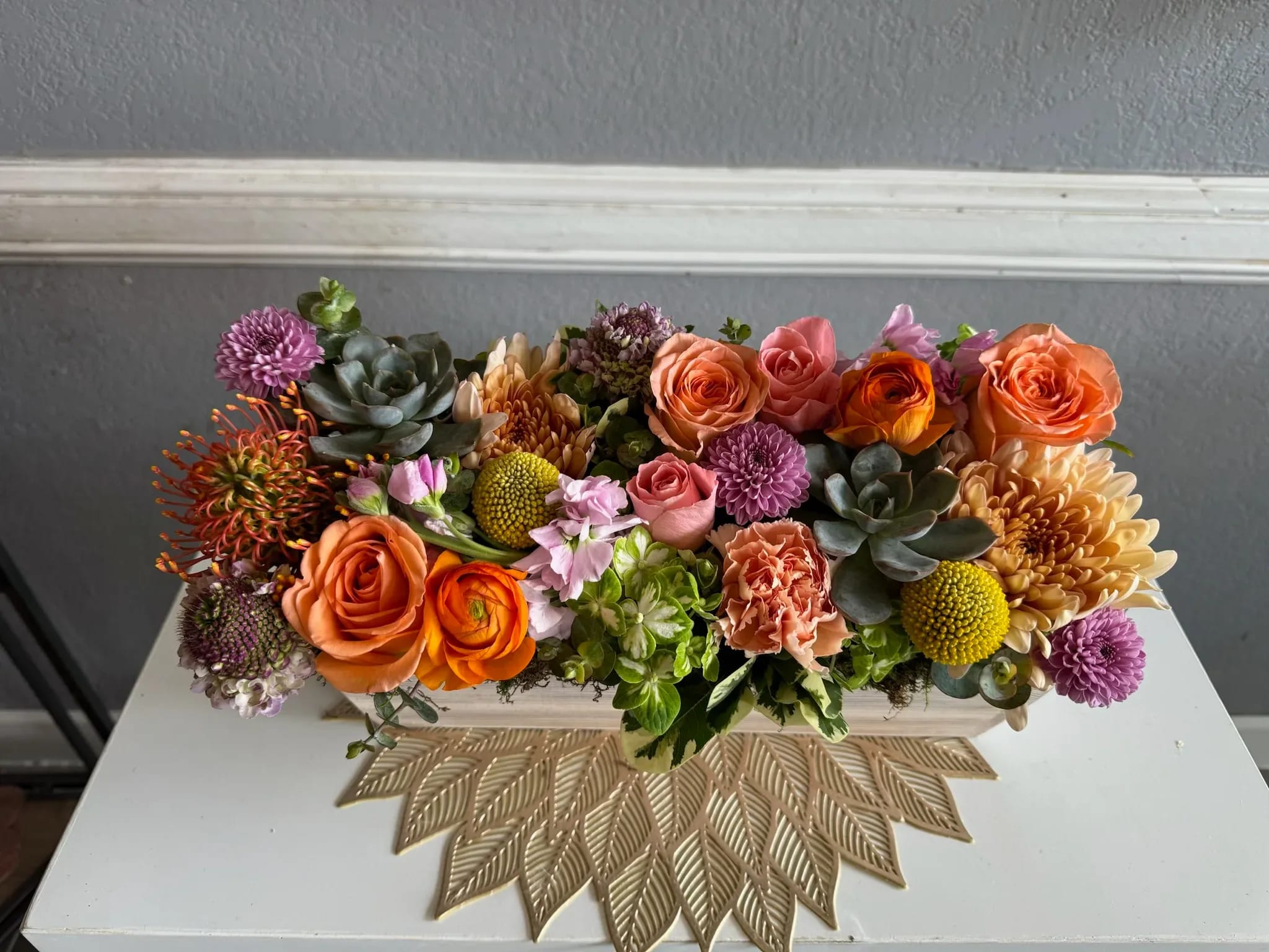 To Love And Be Loved  - Floral Head Box with textured florals and succulents inside a wooden box. 