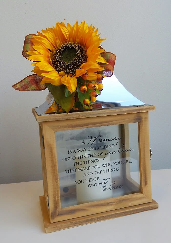 SYM-10 - Memory Lantern W/LED Flameless Candle - Can Be Customized W/Faux Flower Blossom.  Inscription says "A Memory is a Way of Holding Onto the Things You Love, the Things That make You Who You Are, and the Things You Never Want to Lose".