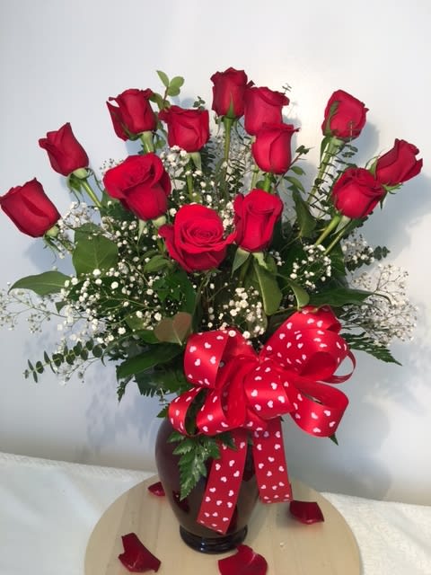 Dozen Red Roses by Maya Studio Florist (06) - These dozen red roses with red vase and bow are the classic romantic gift! Perfect for Valentine's Day or an Anniversary. 
