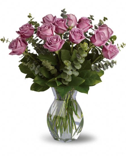 Lavender Wishes - Romantic roses with a lavender twist! A thoughtful selection for the purple-lover in your life, this arrangement of one dozen lavender roses features beautiful spiral eucalyptus and rich green salal.