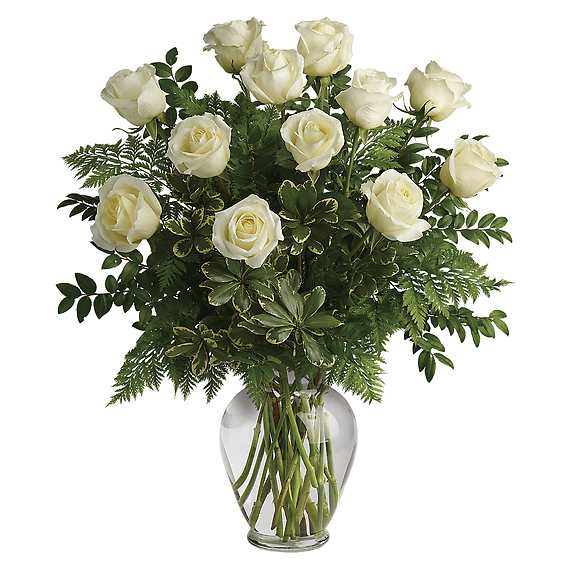 JOY OF ROSES BOUQUET - Pure joy! One dozen wondrous white roses take center stage in this chic bouquet, delivered with stylish greens in a classic urn vase.  