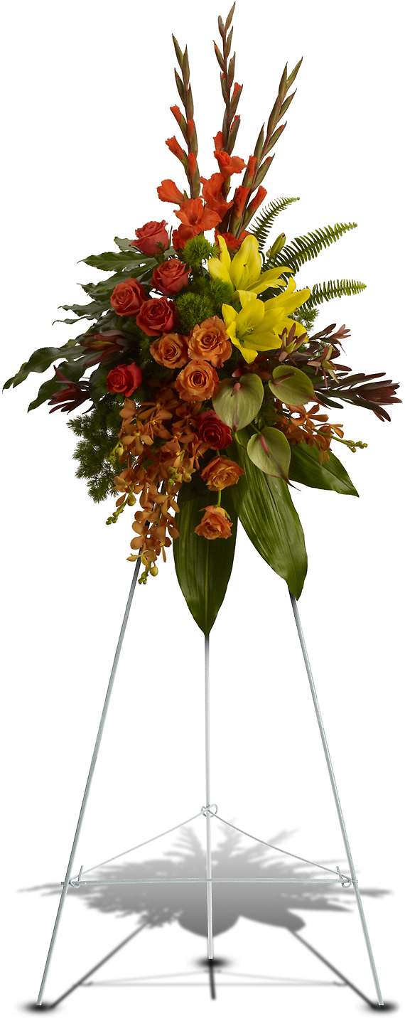 TROPICAL TRIBUTE SPRAY - A graceful modern funeral spray of warm colors, it includes flowers such as anthuriums, roses and tropical greenery. Presented as a standing easel display.  