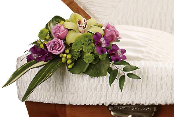 DEAREST ONE CASKET INSERT - This exquisite arrangement of floral favorites featuring a green cymbidium orchid placed inside the casket is an intimate expression of abiding love.  