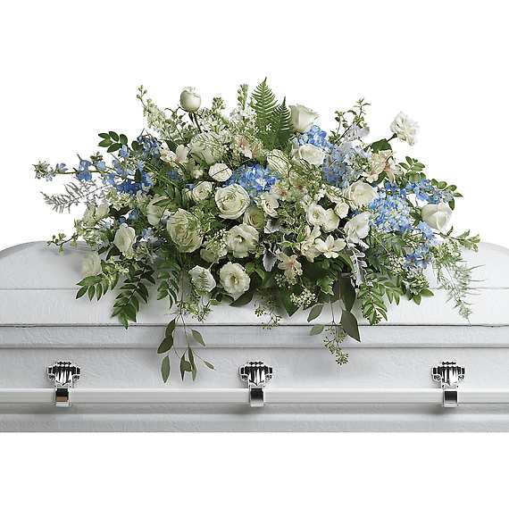 TENDER REMEMBRANCE CASKET SPRAY - Like wisps of clouds in a bright blue sky, this breathtaking spray of hydrangea, roses and alstroemeria refreshes and inspires. A beautiful way to remember your loved one.  