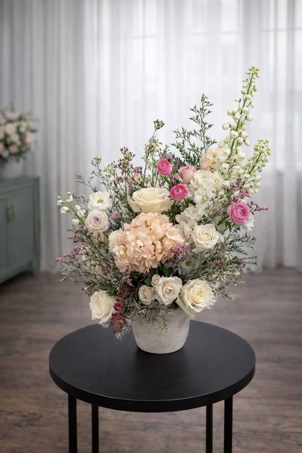 Large Designer Choice - Designer’s Choice floral arrangement featuring a modern, airy design. Perfect for businesses, events, offices, or gifting. Each piece is uniquely crafted using fresh premium seasonal blooms.