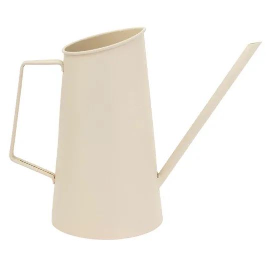 Almond Metal Watering Can - Sculptural and streamlined, the Almond Metal Watering Can features a long, slender spout for a precise, gentle pour to reach planters and hanging baskets. Crafted of durable metal in a soft almond hue, it works as beautifully as it looks, doubling as a chic decor accent between waterings. Approximate dimensions are 10 x 4.75 x 8.25 inches