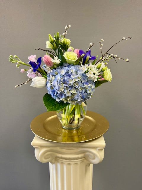 Happy Spring - A glass bowl filled with a beautiful assortment of Spring flowers! Simple and stunning!