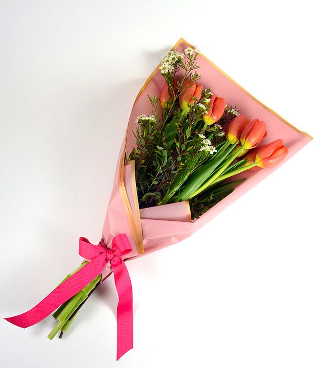 Tulip Meadow Bouquet  - Tulip Meadow showcases fresh tulips complemented by beautiful wax flower for a delicate, garden-inspired look. A simple yet stunning way to make someone's day or celebrate any occasion!