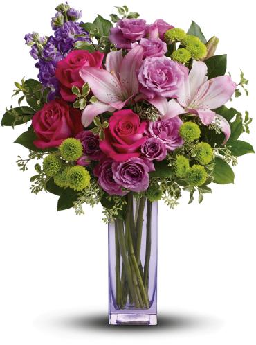 Fresh Flourish Bouquet - No one can resist the beauty of this bright bouquet! A sublime way to celebrate any occasion, this special delivery blends hot pink and lavender roses with pink lilies and lime green button mums for a look that's pure heaven. It's all artfully arranged in our exclusive, lovely lavender glass vase they'll always treasure.  This luxe bouquet includes hot pink roses, lavender spray roses, pink asiatic lilies, lavender stock, green button spray chrysanthemums, pitta negra, seeded eucalyptus and lemon leaf. 