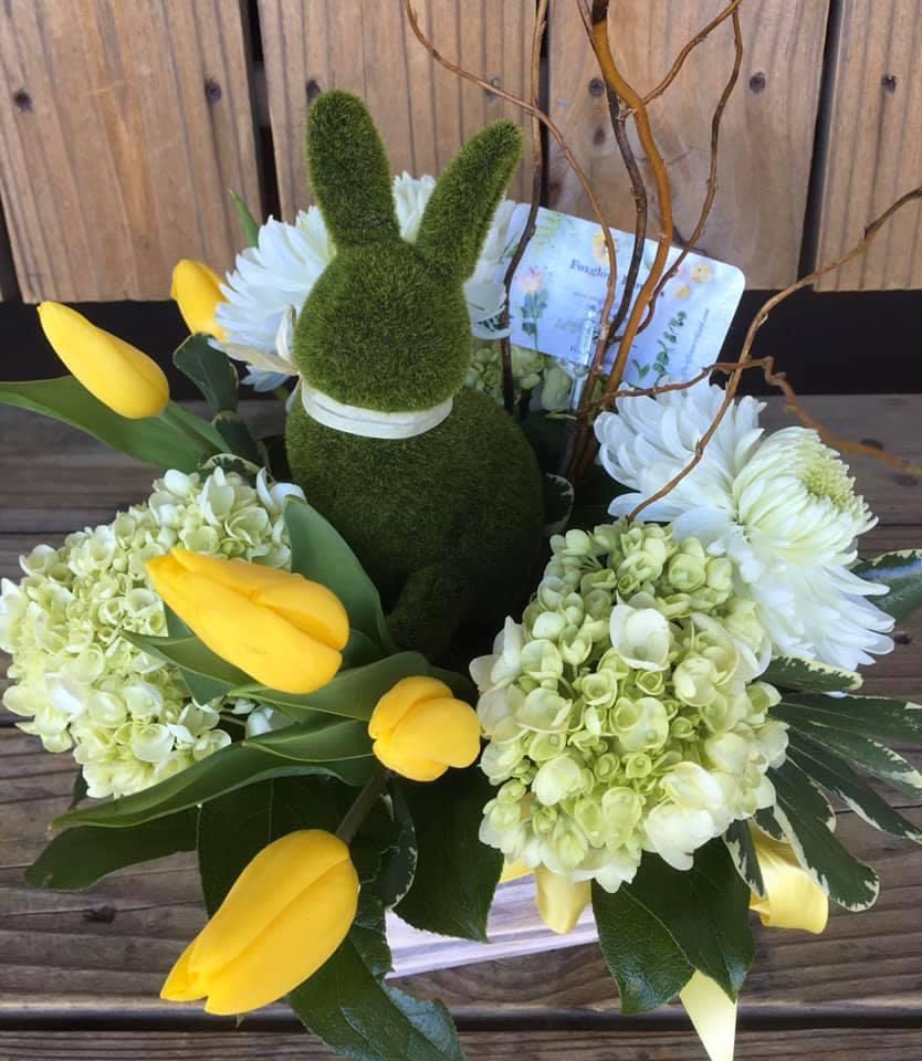 Hop into Spring - Hop into Spring with this moss bunny floral arrangement, that features Hydrangeas, Mums, Tulips and Curly Willow.