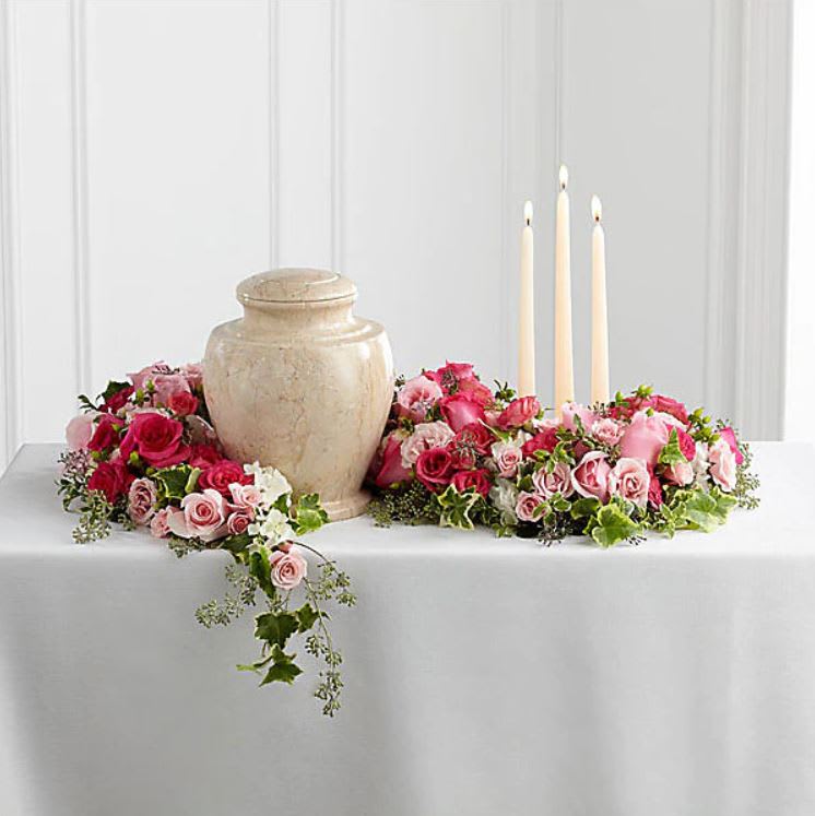 Urn Floral Garland  - Fresh floral garland, perfect for any table top. Designed with fresh flowers, this piece comes in various lengths to cater to your needs and budget.  STANDARD - 6.5" H x 36" L DELUXE - 6.5" H x 48" L  Urn, candles and any other table decor not included. 