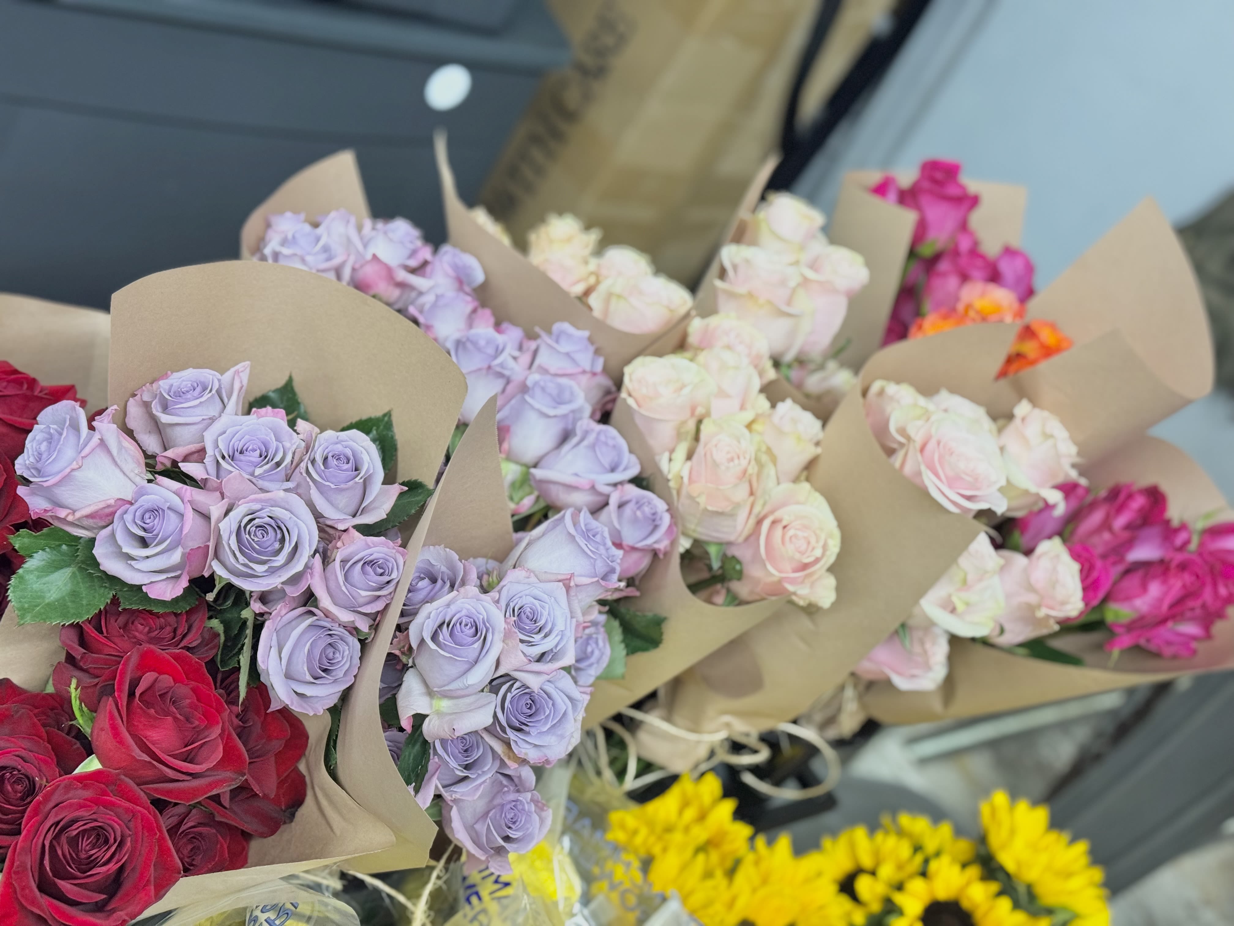 Roses - Flower Market - Color varies on availability. You may request but color is not guaranteed.  Standard - Bunch of 25 stems Deluxe - Bought by the stem Premium - Bought by bunch 10+