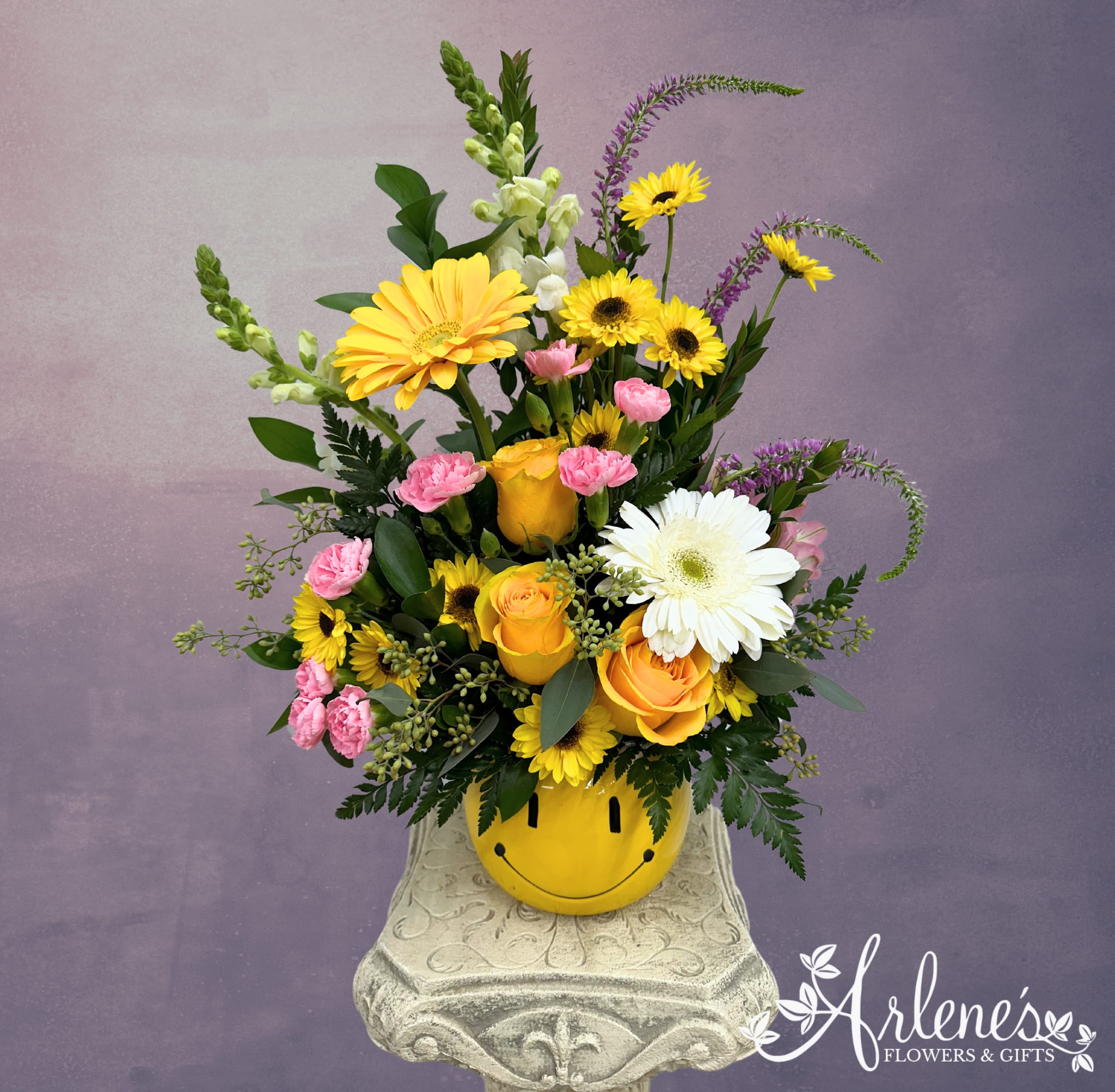Garden of Smiles - This will be a scoop of joy (designer will often change the colors and style) in this happy face vase! Perfect for a get well or brighten your day! If you have any requests for colors, please put them in the notes and we'll see what we can do!