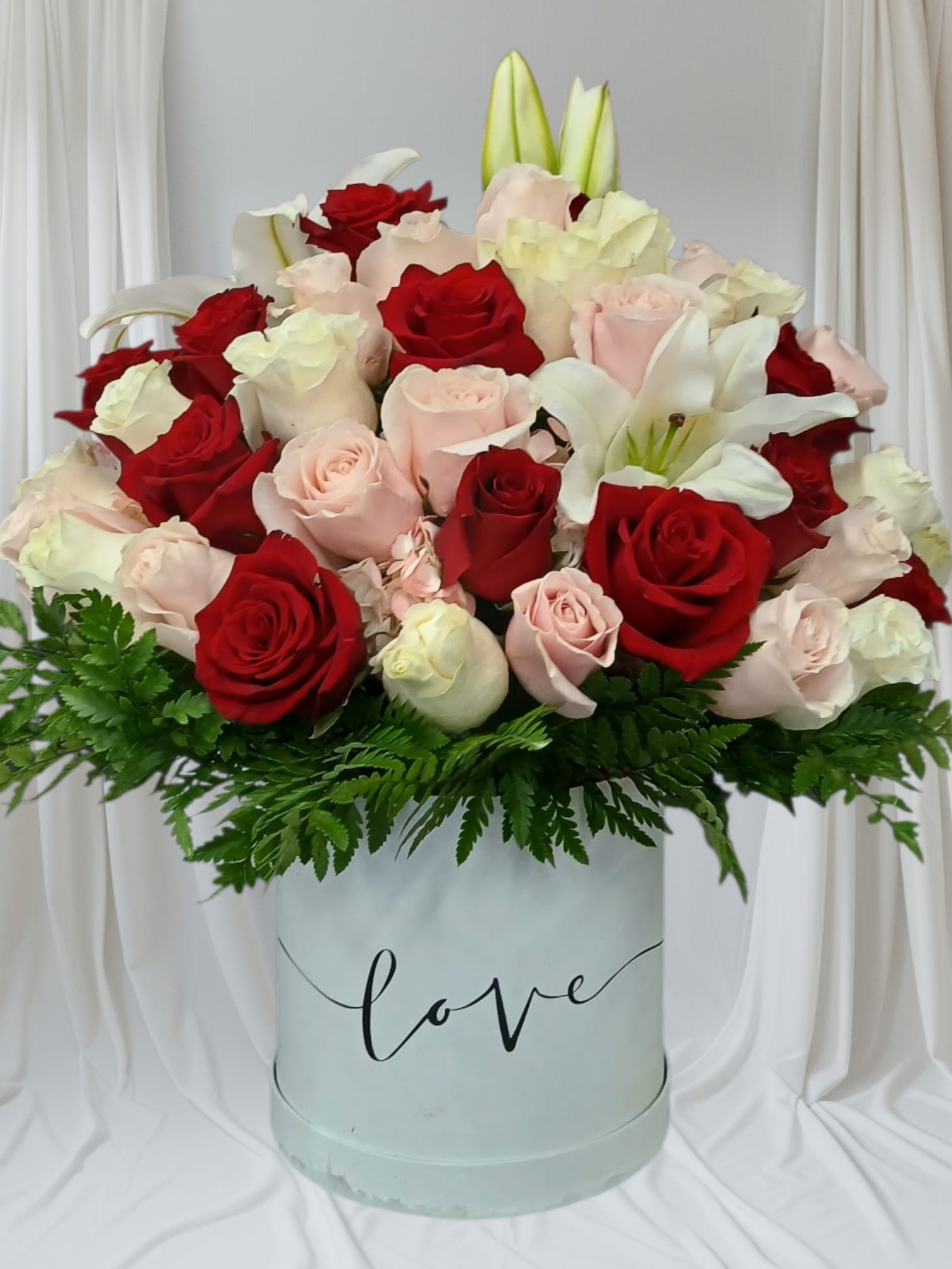 Box roses and fragrant stargazer lilies - This stunning bundle features a breathtaking bouquet of classic red, pink, white roses, fragrant stargazer lilies,