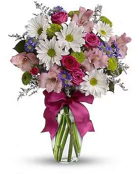 Pretty Please - Looking for the prettiest bouquet in town? We've got the perfect all-around choice! Pretty Please is a flower bouquet with all the right stuff - a lovely mix of fresh flowers in breezy shades of pink, white, lavender and more at a wonderfully reasonable price, all tied up with a big pink bow. A great way to make someone smile.  A mix of fresh flowers such as spray roses, daisy and button spray chrysanthemums, Monte Cassino asters and limonium, in shades of white, pink, green, purple and lavender. Delivered in a vase adorned with a matching ribbon.