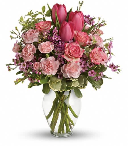 Full Of Love Bouquet - Spring into pink! Delicate roses, tulips and carnations fill a graceful vase with a cheerful expression of your love. It's affection perfection! 
