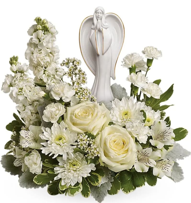 Guiding Light Bouquet - Peaceful and majestic a graceful angel (*the actual angel may be different than pictured*) rests amongst a bed of white- a touching tribute to a bright life and your unending support. White roses white alstroemeria white stock white miniature carnations white cushion spray chrysanthemums are arranged with white waxflower dusty miller and variegated pittosporum. Delivered with an Angel of Grace keepsake.  APPROX SIZE: 14W x 13H  PLEASE NOTE: OVERALL SIZE DOES NOT CHANGE SIGNIFICANTLY AT DELUXE &amp; PREMIUM LEVEL - THEY ARE JUST FILLED OUT WITH ADDITIONAL STEMS OF FLOWERS.