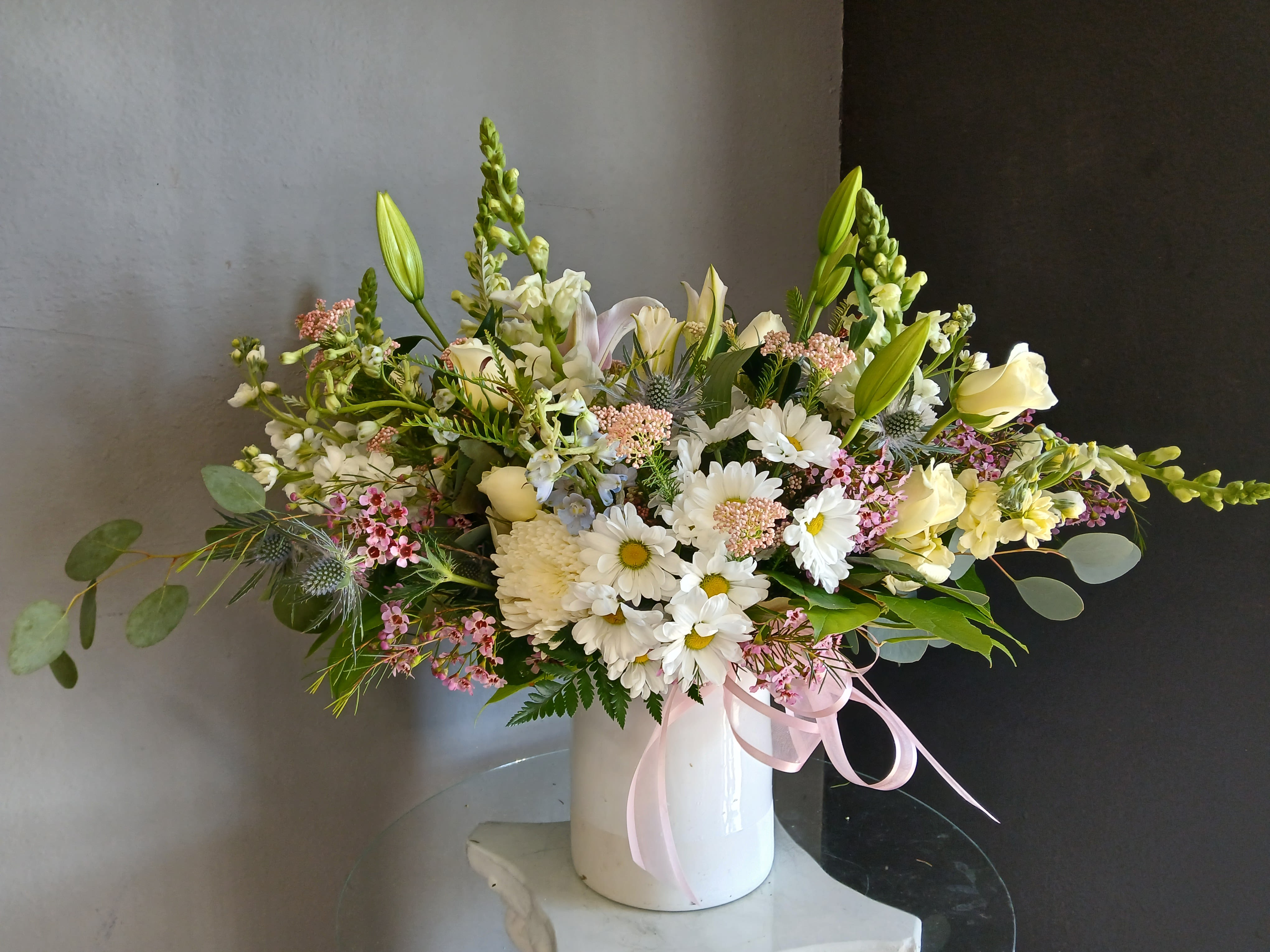 736 Designer's Choice  - This beautiful flower arrangement of fresh mixed seasonal blooms is made by local designers in the heart Orange California. Hand crafted and perfect for every occasion, from birthdays and new babies to sympathy and just because. The best choice to show you are thinking of that special someone. Can be sent as a local delivery or in-store pickup. This is an original, one of a kind arrangement. Order now before it's too late!