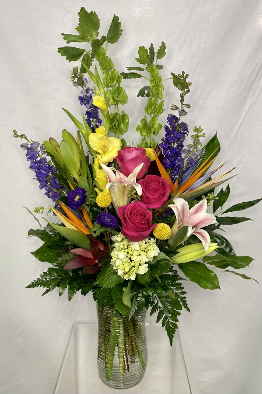Tropical Paradise  - Enjoy a fresh mix of tropical flowers. 