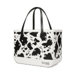 Bogg Bag Original - Cowboy Chic - The bag that started it all—washable, indestructible, and built to carry it all. The Original Bogg Bag is our largest, most spacious tote—perfect for beach days, big hauls, and everyday family adventures.  Durable and tip-proof, it stands upright, wipes clean, and keeps up with whatever your day throws at it. Sand brushes off. Spills don’t stick.  Includes two clear insert bags—perfect for organizing smaller essentials like your phone, sunscreen, keys, or snacks.  Pair it with our full line of Bogg accessories—dividers, toppers, coolers, makeup bags, and more—to build your ultimate carryall kit.  Best for: Beach trips, travel days, family outings, and everything in between.