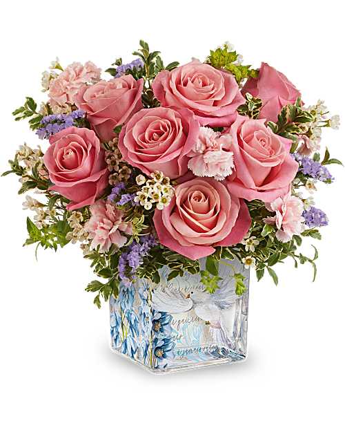 Whispers of Grace - Whispers of Grace Bouquet features pink roses, miniature pink carnations, lavender sinuata statice, white waxflower, bupleurum, and oregonia, arranged in Teleflora's Written In The Sky Cube, a glass cube featuring a dove and floral design.