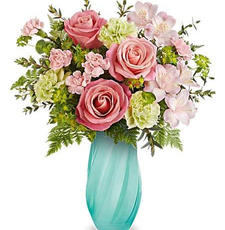 Teleflora's Meadow Mist Bouquet - Soft and refreshing, Teleflora's Meadow Mist Bouquet captures the gentle beauty of blooming fields with coral roses, pink alstroemeria, and green carnations in a sculpted glass vase with graceful diagonal swirls.