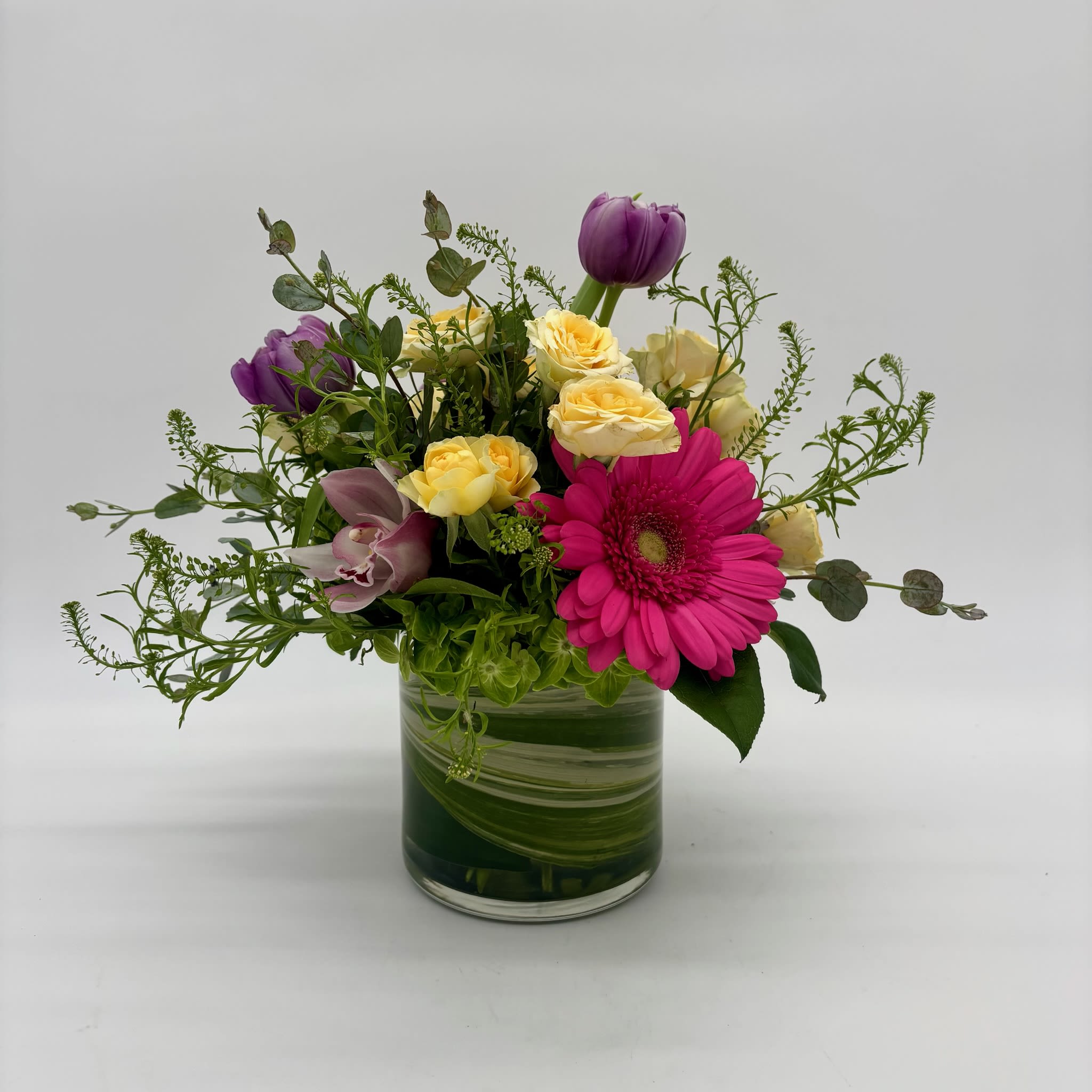 Designer's Choice Vase Arrangement (see notes) - A unique vase arrangement made by our designers, allowing them to select an assortment of blooms for you from our current in-store stock. Available to order in standard, deluxe or premium. Particular flowers to add or subtracted available upon request. If no notes, designer will choose based on available product. Flowers and colors will vary based on season and availability.