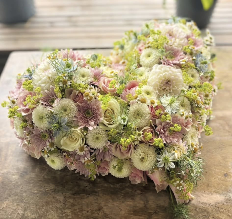 COLORFUL HEART - A beautiful heart-shaped box with a wide variety of beautiful and vibrant flowers, perfect for any occasion to tell your loved one how much you love them.