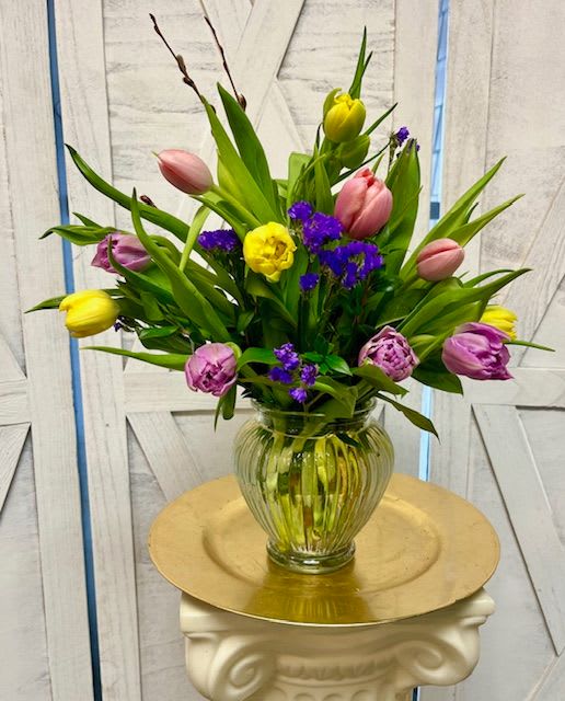 Springtime In A Vase - A vase full of tulips with pretty accents is Springtime in a vase! Bring the season indoors and enjoy watching the tulips grow!