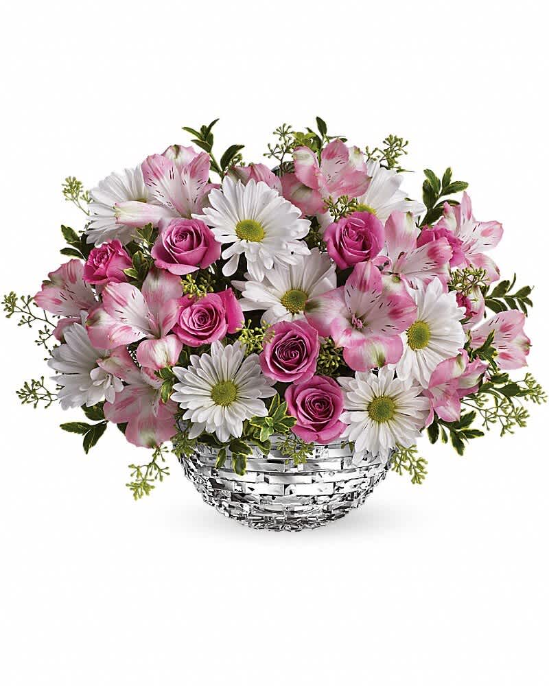 Teleflora's Facets Of Spring Centerpiece - The sparkle of spring is here! This dazzling centerpiece is beautifully arranged in a spectacular glass bowl. Your spring table will positively sing! Includes hot pink spray roses, pink alstroemeria and white daisy chrysanthemums, accented with fresh oregonia and seeded eucalyptus. Delivered in a Sparkling Glass Bowl.