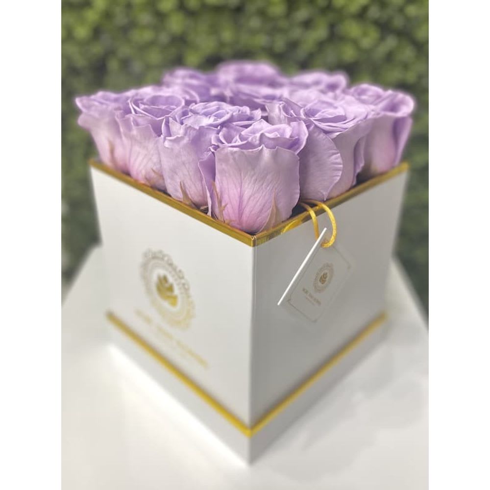 Eternal Roses Square Box - White Box, Lavender - Eternal Roses Square Box: We stopped the clock for our preserved roses to experience our Eternal Deluxe Collection timelessly. 12 preserved roses decorated in our signature deluxe square boxes and completed with a bow and a personalized card message, trendy and fancy. Roses that Last 3 years. *Avoid direct sunlight, dust, water or excessive heat. *Available for Nationwide Shipping (5-7 days shipping time)