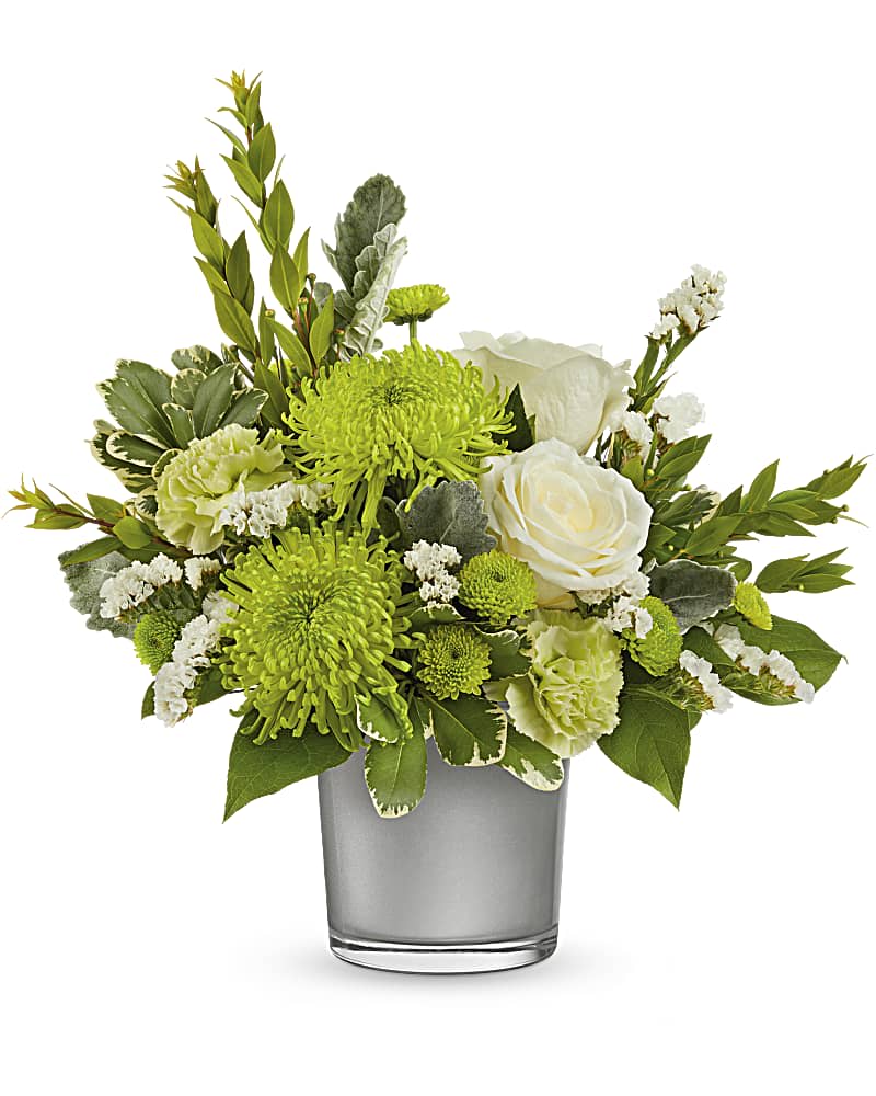 Teleflora's Find Beauty Bouquet - An energizing bouquet for any beautiful moment, these bright green blooms look fresh and modern in a sleek, silvered glass vase. This bouquet includes white roses, green carnations, green button spray chrysanthemums, green fuji chrysanthemums, white sinuata statice, variegated pittosporum, myrtle, dusty miller and lemon leaf. Delivered in a Polished Gem Cylinder.