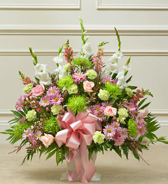 Heartfelt Tribute Pastel Floor Basket Arrangement - When you’re trying to find a way to express your deepest sympathy, this pastel sympathy floor basket helps you beautifully say what is in your heart. Our expert florists use only the freshest blooms, including pastel roses, gladiolas, snapdragons and more, to show your love and concern for family, friends and colleagues during a difficult time.