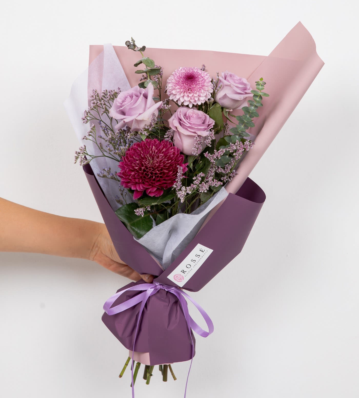 Little Lavender - A small front-facing bouquet featuring lavender flowers and delicate fillers.  Color combinations can be customized upon request.  Flower types may vary depending on the season.
