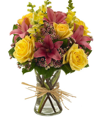 Elegant Flower Bouquet  - Celebrate a special occasion today with an elegant flower bouquet! This thoughtful gift is arranged with yellow snapdragons, yellow roses, pink asiatic lilies and pink waxflower. The selection of yellow and pink flowers are delivered in a classic gathering vase, wrapped in decorative raffia bow