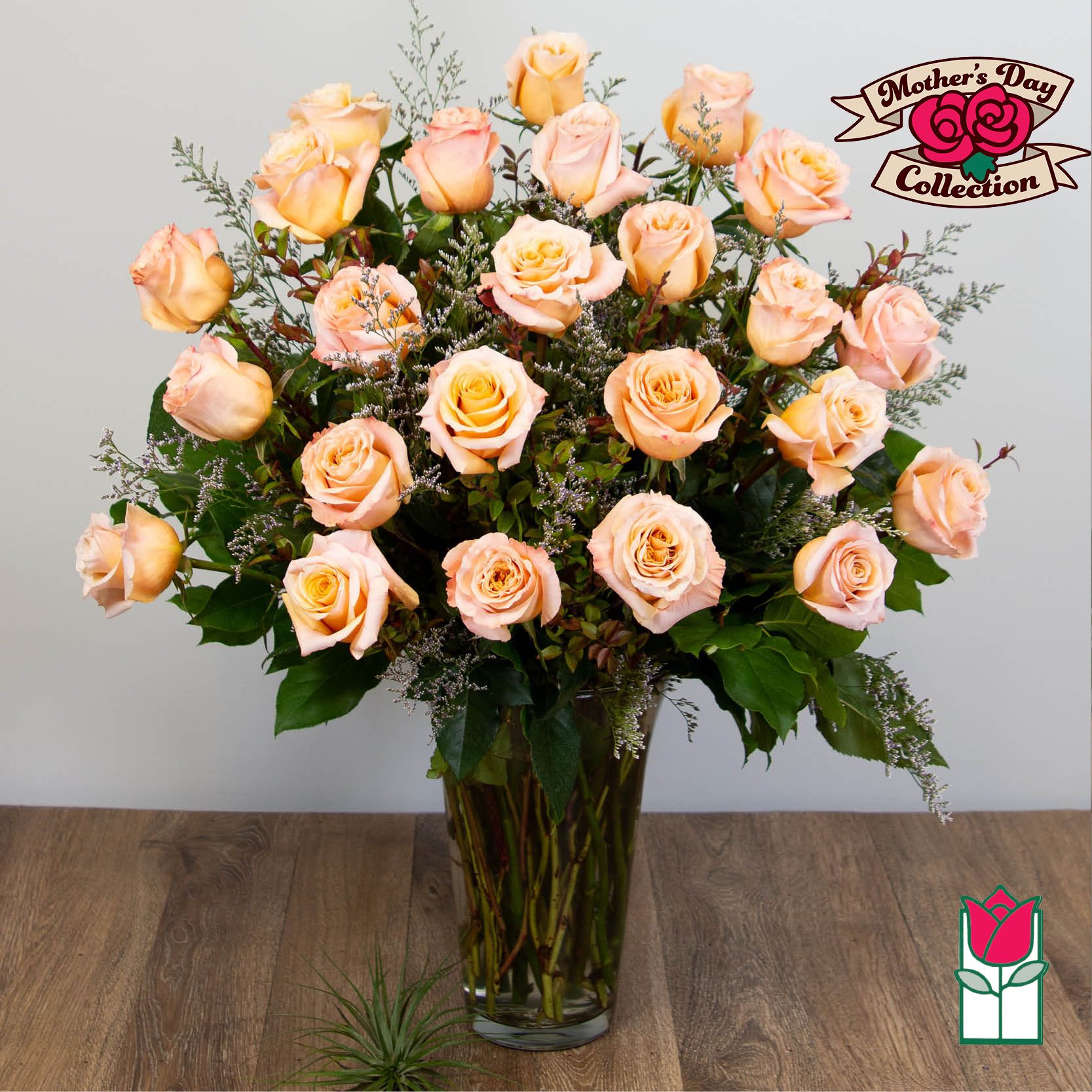 Beretania's 2 Doz. Extra Long Stem Peach Rose Bouquet - 2 Dozen Premium Extra Long Stem Peach Roses  Indulge in the timeless elegance of the Beretania Florist Premium Extra Long Stem Roses bouquet. Our exquisite bouquet features premium Ecuadorian extra-fancy roses, which are 30% larger than any other rose in the islands. Available in a classic glass vase with assorted foliage and filler flowers, this bouquet is the perfect gift for any occasion.  But our exceptional product is only half the story. At Beretania Florist, we pride ourselves on our professional and convenient delivery service. We carefully hand-deliver each bouquet to ensure it arrives at its destination in pristine condition. Our team is dedicated to providing the highest level of customer service, and we strive to exceed your expectations with every order.  And for added convenience, we offer the option to choose or upgrade the number of roses in your bouquet. Whether you prefer a classic one dozen, a stunning one and a half dozen, a grand two dozen, or an opulent three dozen, we have the perfect bouquet for you.  Trust Beretania Florist to deliver the highest quality roses and the best service in the Honolulu area.