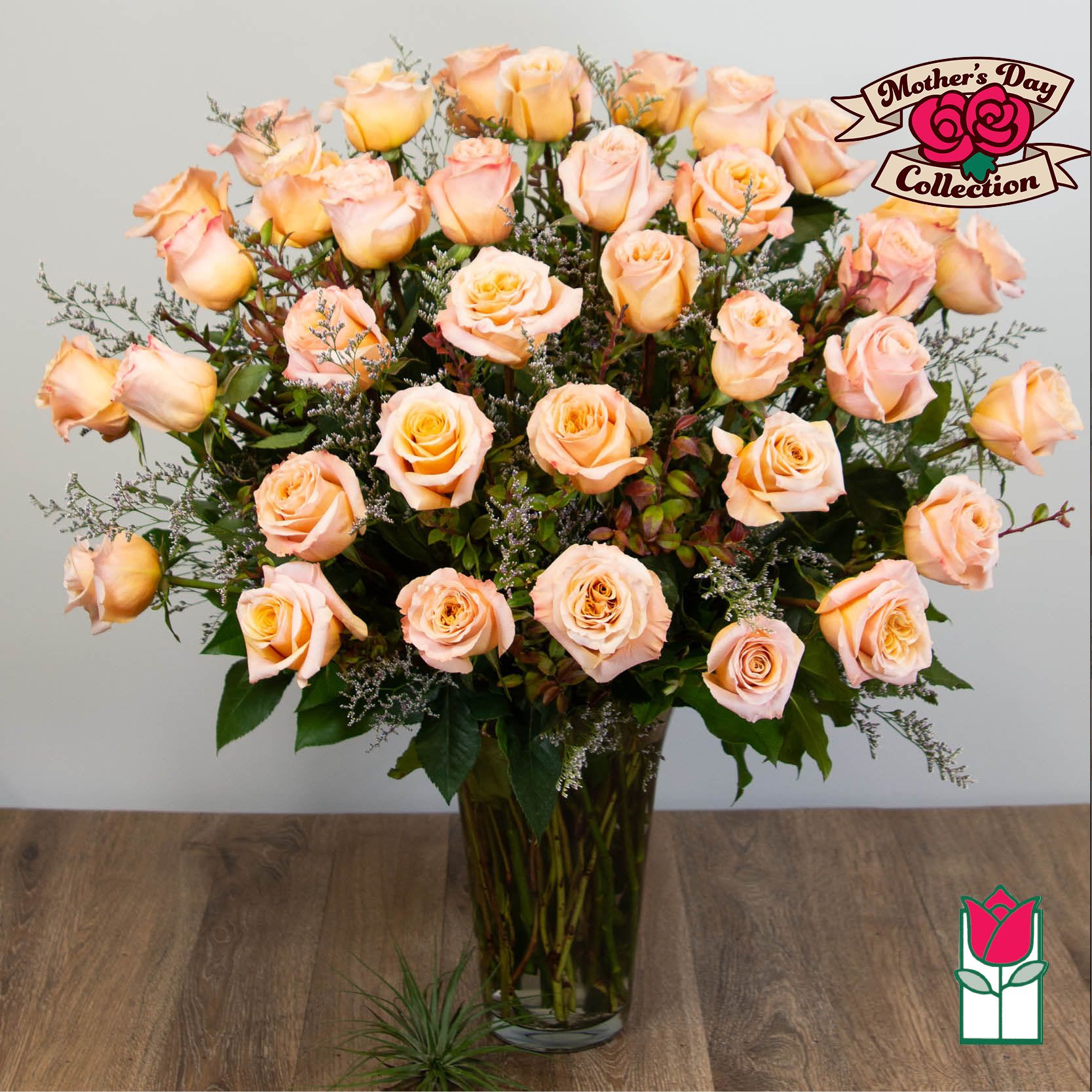 Beretania's 3 Doz. Extra Long Stem Peach Rose Bouquet - 3 Dozen Premium Long Stem Peach Roses  Indulge in the timeless elegance of the Beretania Florist Premium Extra Long Stem Roses bouquet. Our exquisite bouquet features premium Ecuadorian extra-fancy roses, which are 30% larger than any other rose in the islands. Available in a classic glass vase with assorted foliage and filler flowers, this bouquet is the perfect gift for any occasion.  But our exceptional product is only half the story. At Beretania Florist, we pride ourselves on our professional and convenient delivery service. We carefully hand-deliver each bouquet to ensure it arrives at its destination in pristine condition. Our team is dedicated to providing the highest level of customer service, and we strive to exceed your expectations with every order.  And for added convenience, we offer the option to choose or upgrade the number of roses in your bouquet. Whether you prefer a classic one dozen, a stunning one and a half dozen, a grand two dozen, or an opulent three dozen, we have the perfect bouquet for you.  Trust Beretania Florist to deliver the highest quality roses and the best service in the Honolulu area.