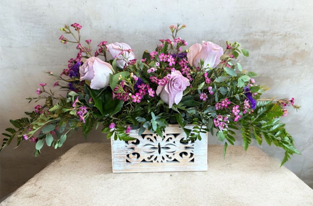 Grey House Blooms - Lavender Garden - Lavender roses with whimsical hot pink wax flower, purple statis in a lattice box. For any occasion 