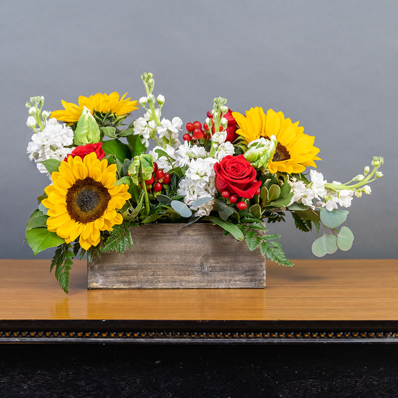Grey House Blooms-Sunny Day - Sunflowers, Roses, Tulips and Stock displayed in a box.