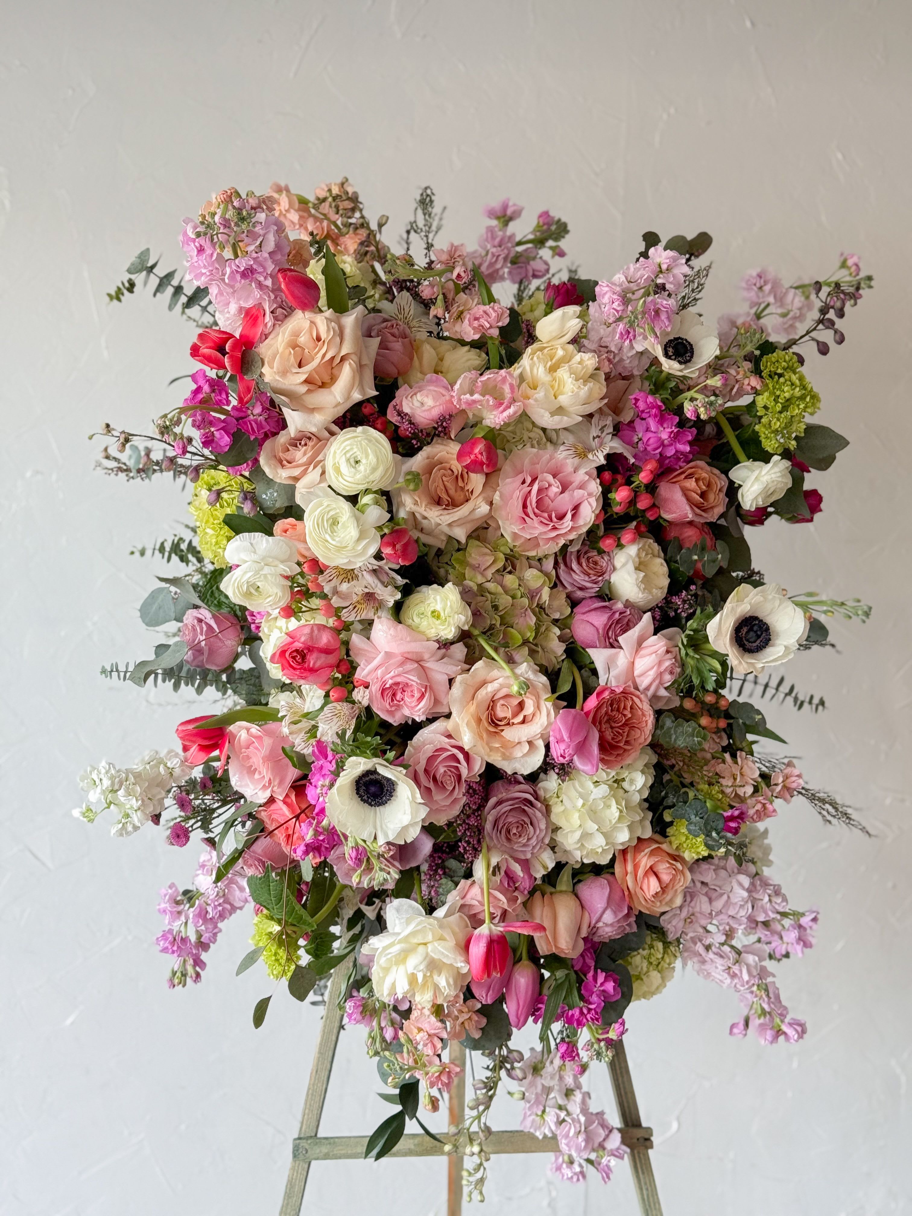 Designers Choice Sympathy Spray  - Sympathy Spray in the same style and colors.  This is a Designers Choice Spray, please call our shop for a custom Spray. Floral Spray will come on a standing Easel.   Pictured is our Deluxe Size.  