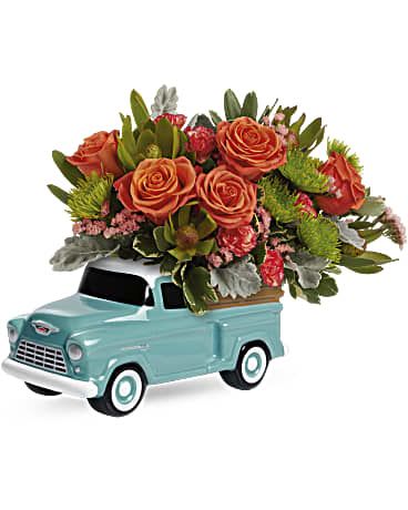 Pick-up Truck  - Bursting with a fresh rose bouquet, this sweet, hand-glazed ceramic Chevy keepsake is a fun celebration for any occasion. We can do any color rose add it to the notes.
