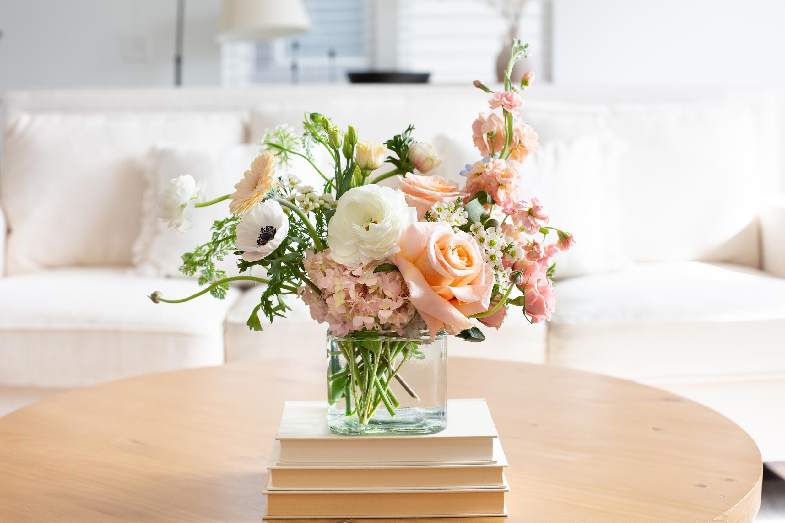Endless Love – Garden Arrangement - (Inspired by the iconic song “Endless Love” by Diana Ross &amp; Lionel Richie)  This elegant peach garden arrangement captures the warmth and tenderness of enduring love. Designed in soft shades of peach, blush, and creamy ivory, the arrangement features premium seasonal blooms including peach roses, ranunculus, anemones, hydrangea, and delicate textural accents.  Arranged in a modern clear glass vase, the flowers are styled with natural movement and airy garden elegance, creating a design that feels fresh, romantic, and refined. Soft peach roses form the heart of the composition while creamy ranunculus and blush hydrangea add depth and texture.  Handcrafted by the designers at ImpeKable Flowers in DeLand, each arrangement is created with carefully selected seasonal flowers sourced from premium growers. The result is a beautiful spring design perfect for celebrating meaningful moments.  A thoughtful gift for Mother’s Day, birthdays, anniversaries, or simply sending love to someone special.  We proudly offer flower delivery throughout DeLand, Lake Mary, Sanford, Deltona, Orange City, DeBary, Altamonte Springs, and surrounding Central Florida communities.  Flower varieties may vary based on seasonal availability while maintaining the same palette and garden style.